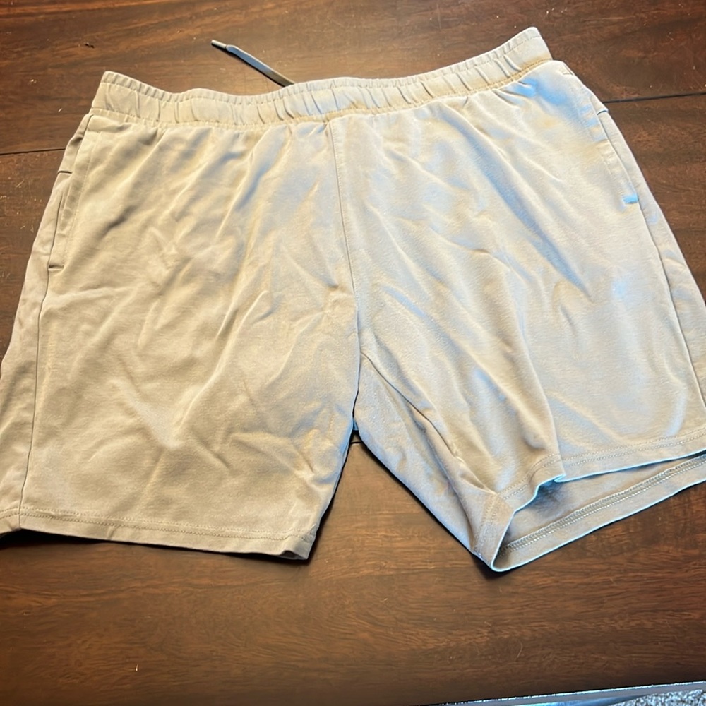 Men’s athletic shorts. Size XL.  Grey. Drawstring waist. Side pockets.